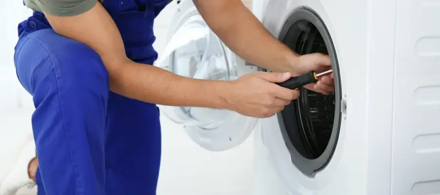 Bosch dryer door switch being replaced during a repair